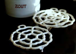 Gietijzeren onderzetter 